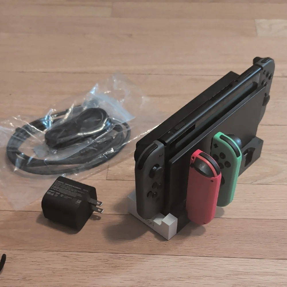 Nintendo Switch with Added Joy cons, Games, Case And Accessories